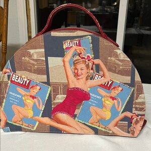 This makeup bag is from the 1940's era, not a replica. RARE. MAKE ME AN OFFER